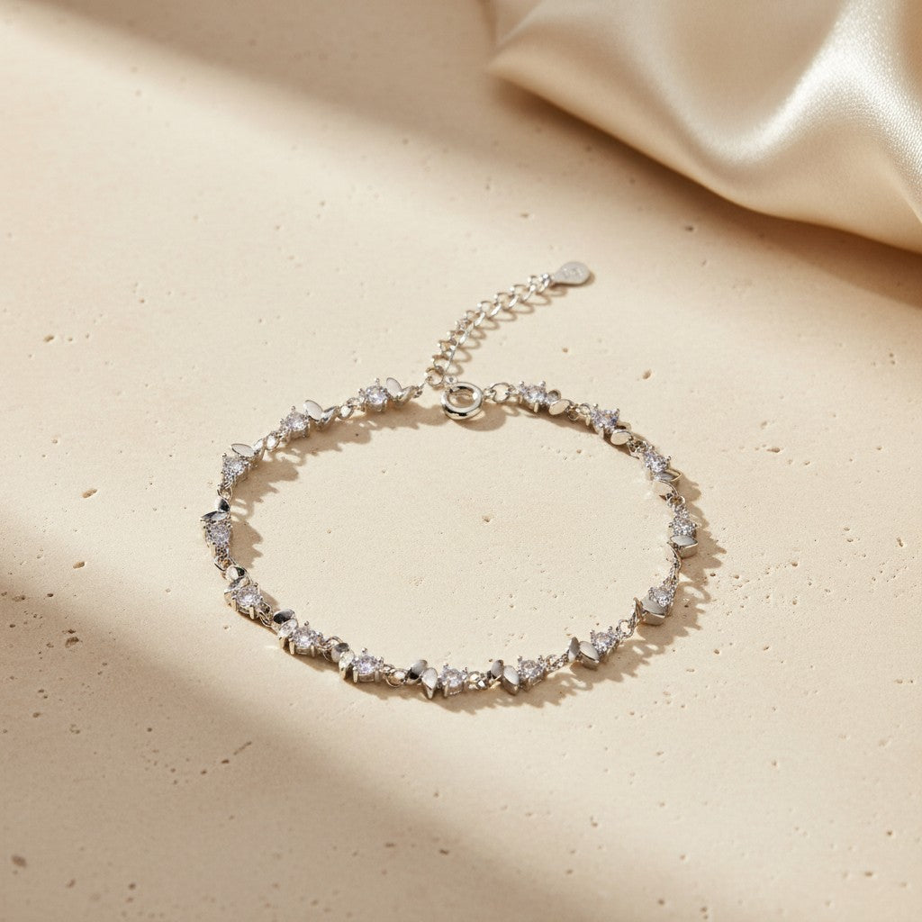 925 sterling silver butterfly cubic zirconia bracelet displayed on a warm neutral surface