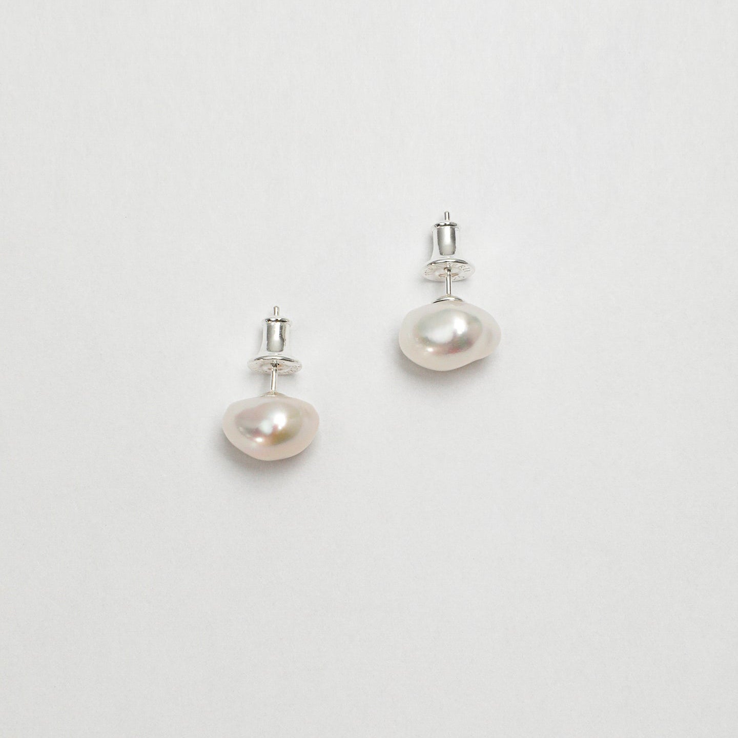 Baroque pearl stud earrings with silver posts and earring backs