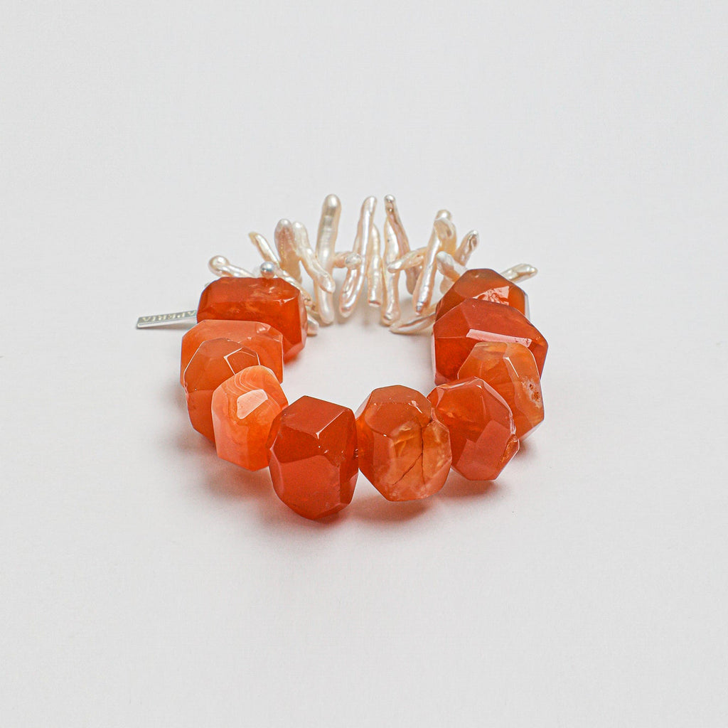Handcrafted carnelian and elongated freshwater pearl statement bracelet