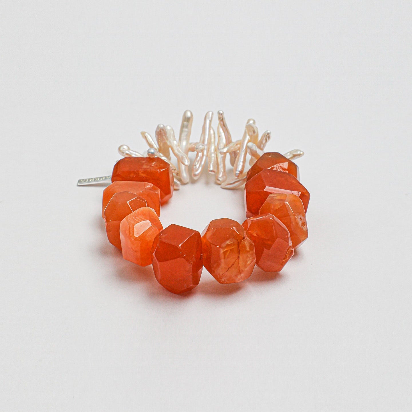 Handcrafted carnelian and elongated freshwater pearl statement bracelet