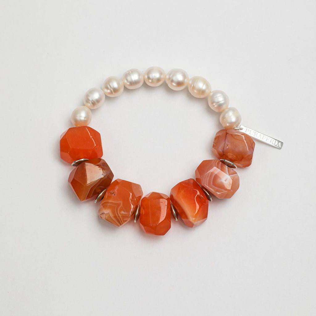 Handcrafted carnelian and freshwater pearl statement bracelet with silver-tone accents