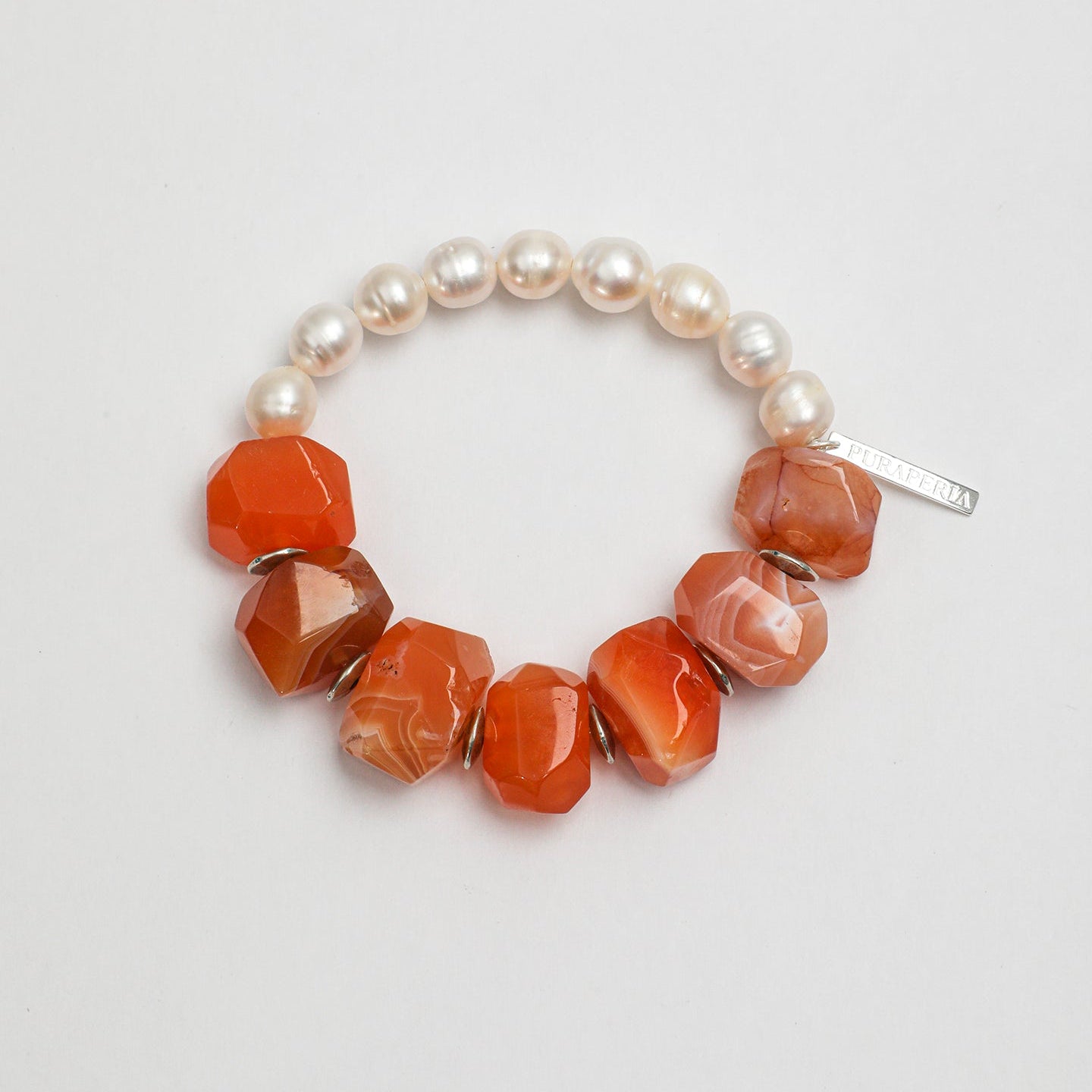 Handcrafted carnelian and freshwater pearl statement bracelet with silver-tone accents