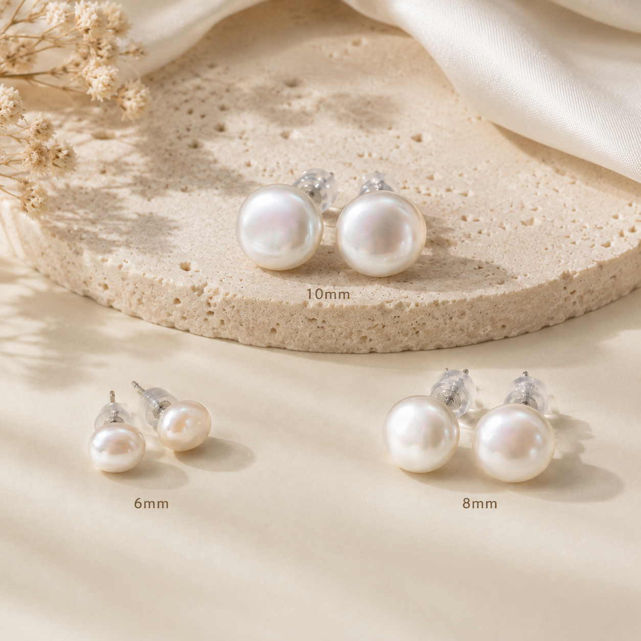 Freshwater Pearl stud earrings with 925 sterling silver posts shown in 6mm, 8mm and 10mm size options