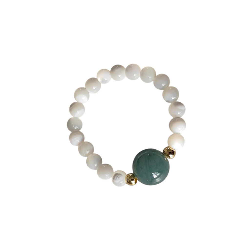 Green Aventurine & White Mother of Pearl Stretch Beaded Ring featuring a polished natural Green Aventurine focal bead, smooth White Mother of Pearl round beads, and gold-tone accent beads on a comfortable elastic band.