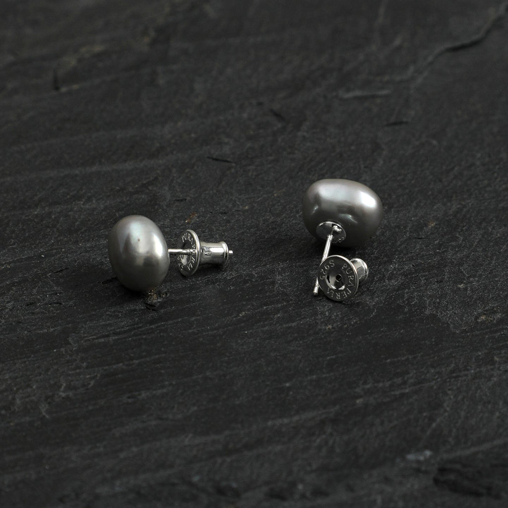 Back detail of grey baroque freshwater pearl stud earrings with silver-tone posts and earring backs
