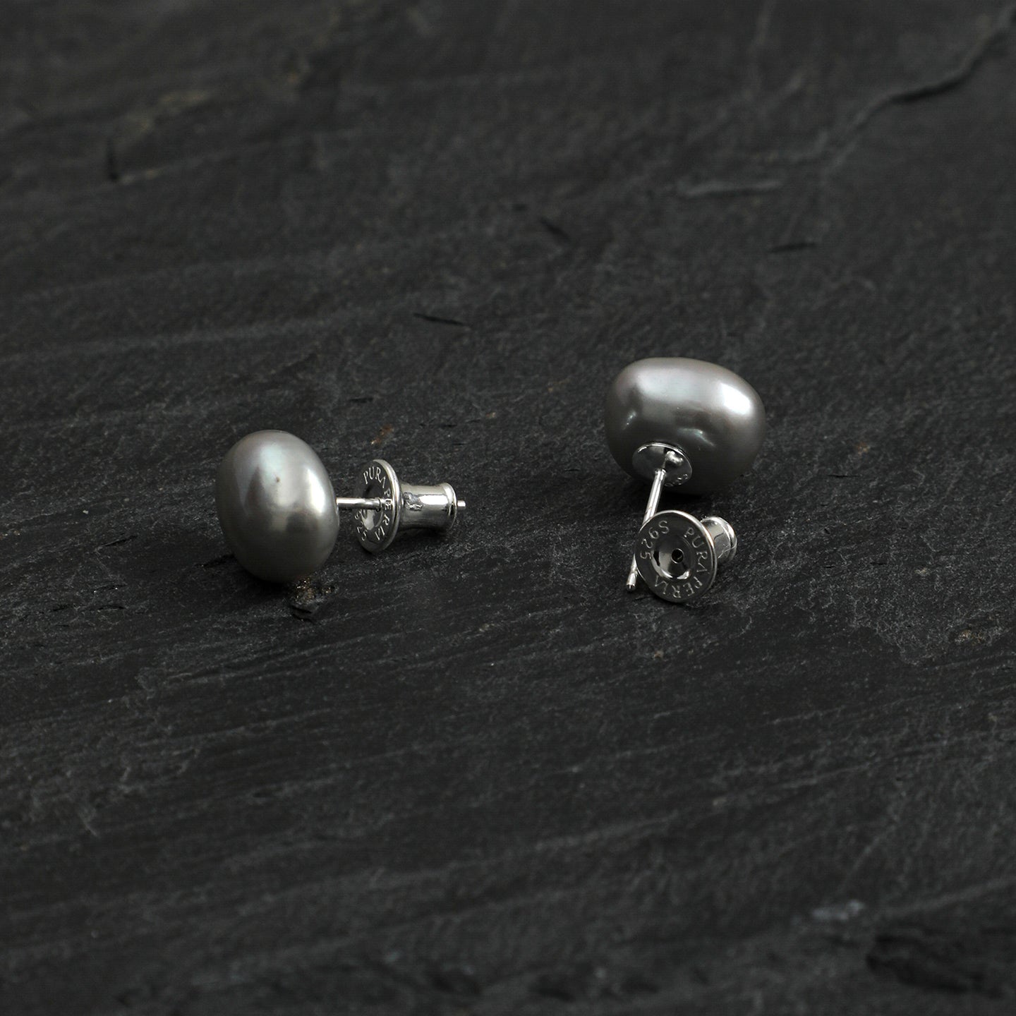 Back detail of grey baroque freshwater pearl stud earrings with silver-tone posts and earring backs
