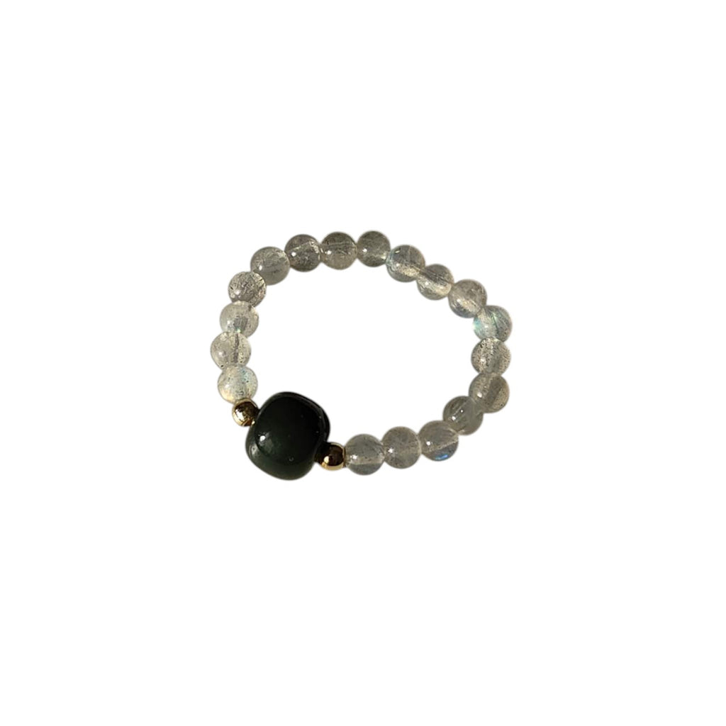 Moonstone & Green Jade Stretch Beaded Ring featuring shimmering natural Moonstone round beads, a polished Green Jade focal bead, and gold-tone accent beads on a comfortable elastic band