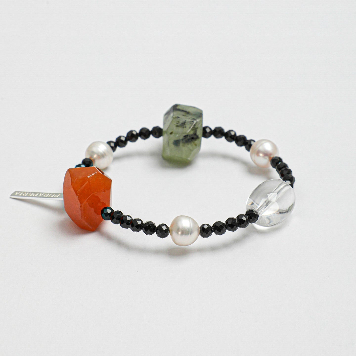 Handmade bracelet with black faceted beads, pearls and multicolor natural gemstones