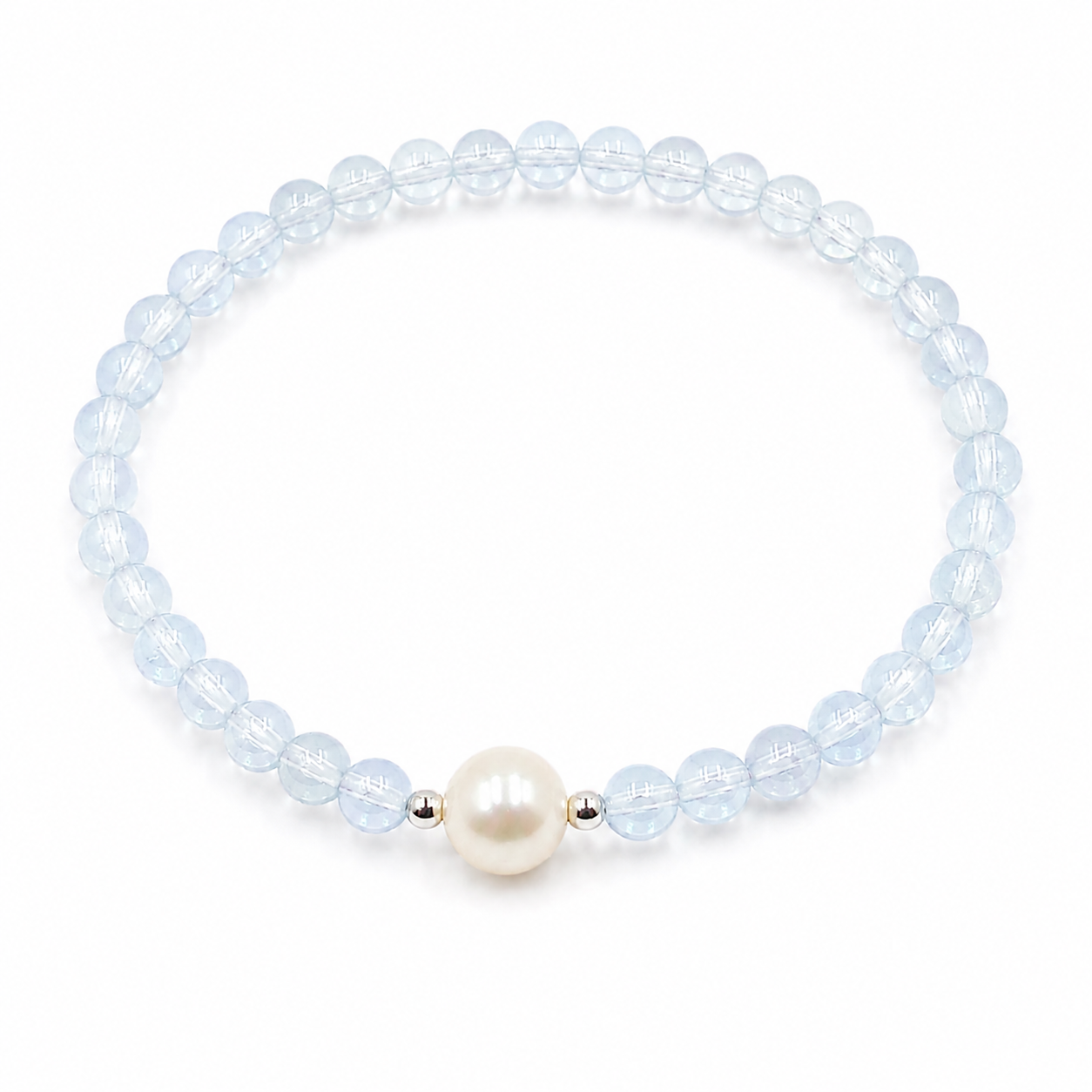 Handmade natural aquamarine bracelet featuring 4mm aquamarine beads, an 8mm genuine freshwater pearl and silver-tone spacer beads on a white background.
