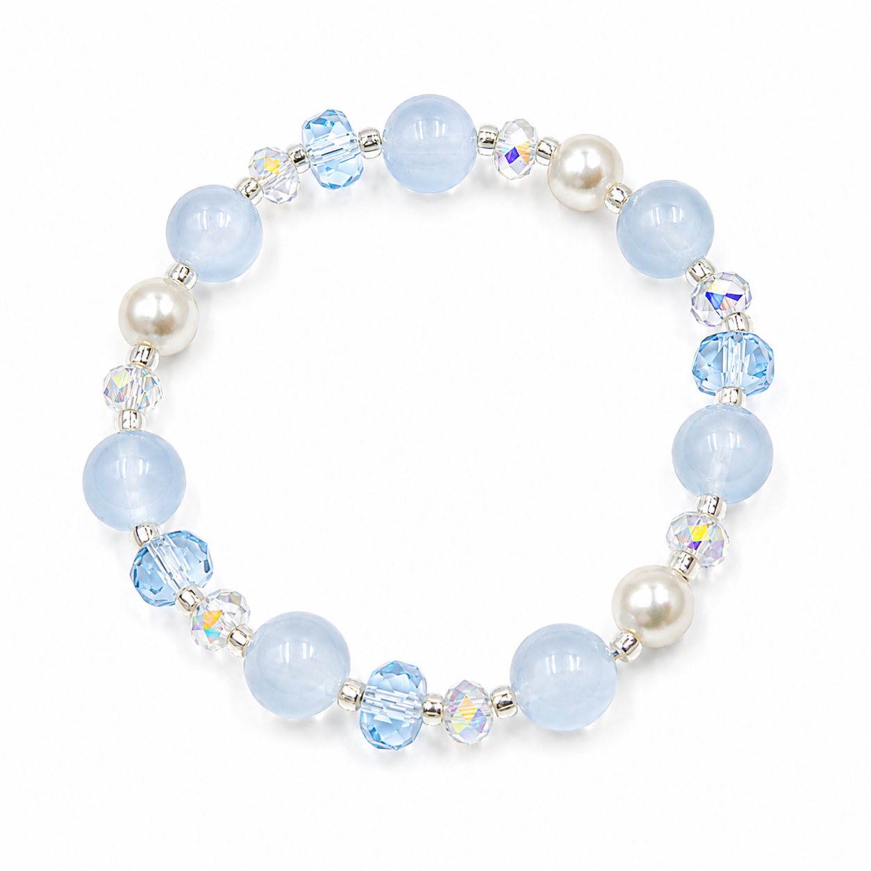 Handmade bracelet featuring 10mm natural aquamarine beads, 8mm genuine freshwater pearls, 8mm blue faceted crystal beads, 6mm aurora crystal accent beads and silver-tone spacer beads on a white background.