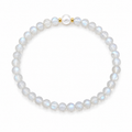 Handmade natural grey moonstone bracelet featuring 4mm grey moonstone beads, a 6mm genuine freshwater pearl and gold-tone spacer beads on a white background.