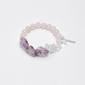 Handmade rose quartz bracelet with amethyst and clear quartz gemstone accents