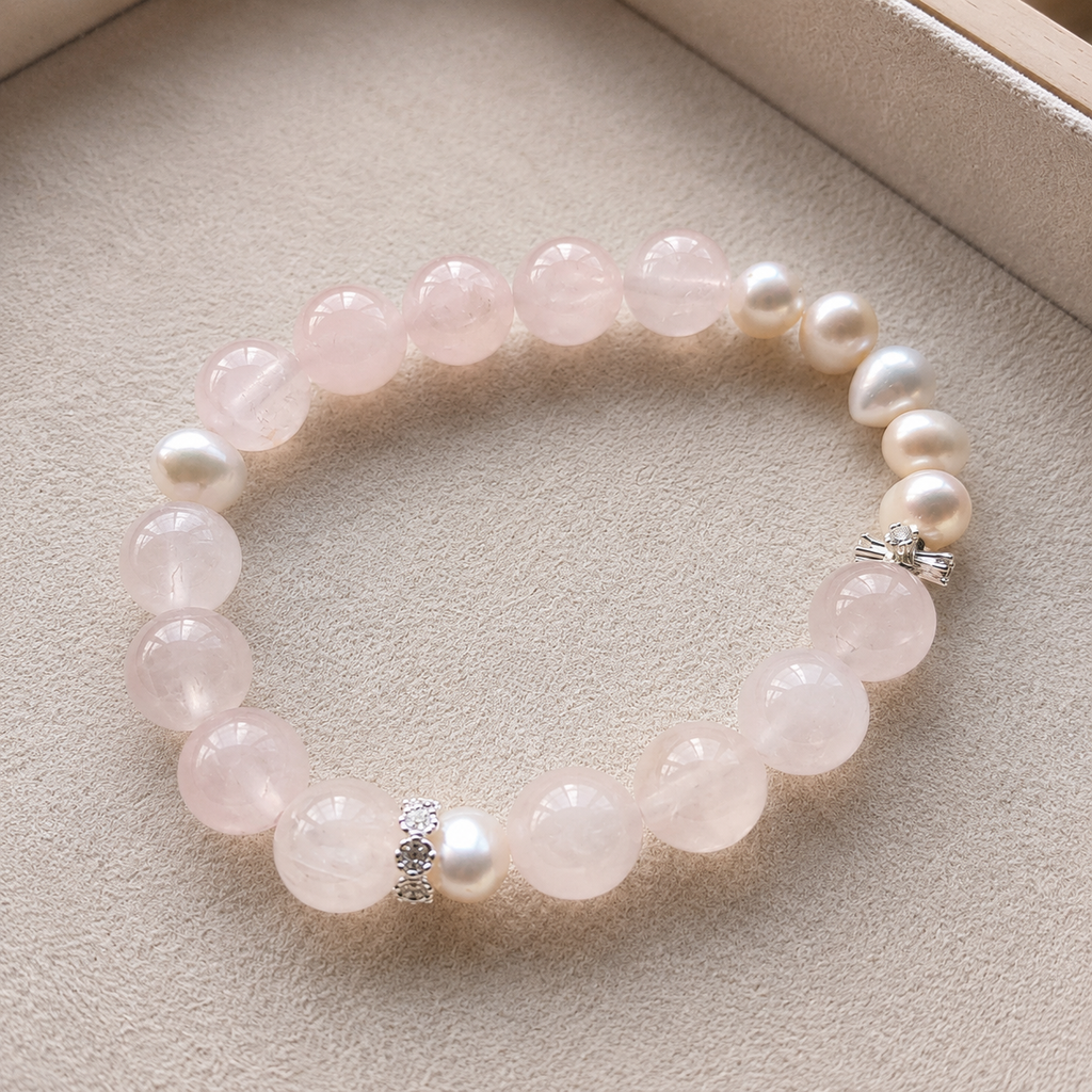 Close view of rose quartz and freshwater pearl bracelet