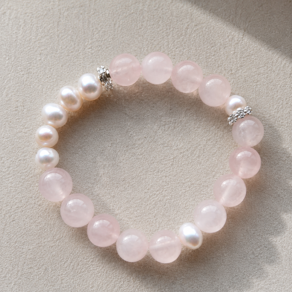 Detail of rose quartz beads, freshwater pearls and silver-tone accents