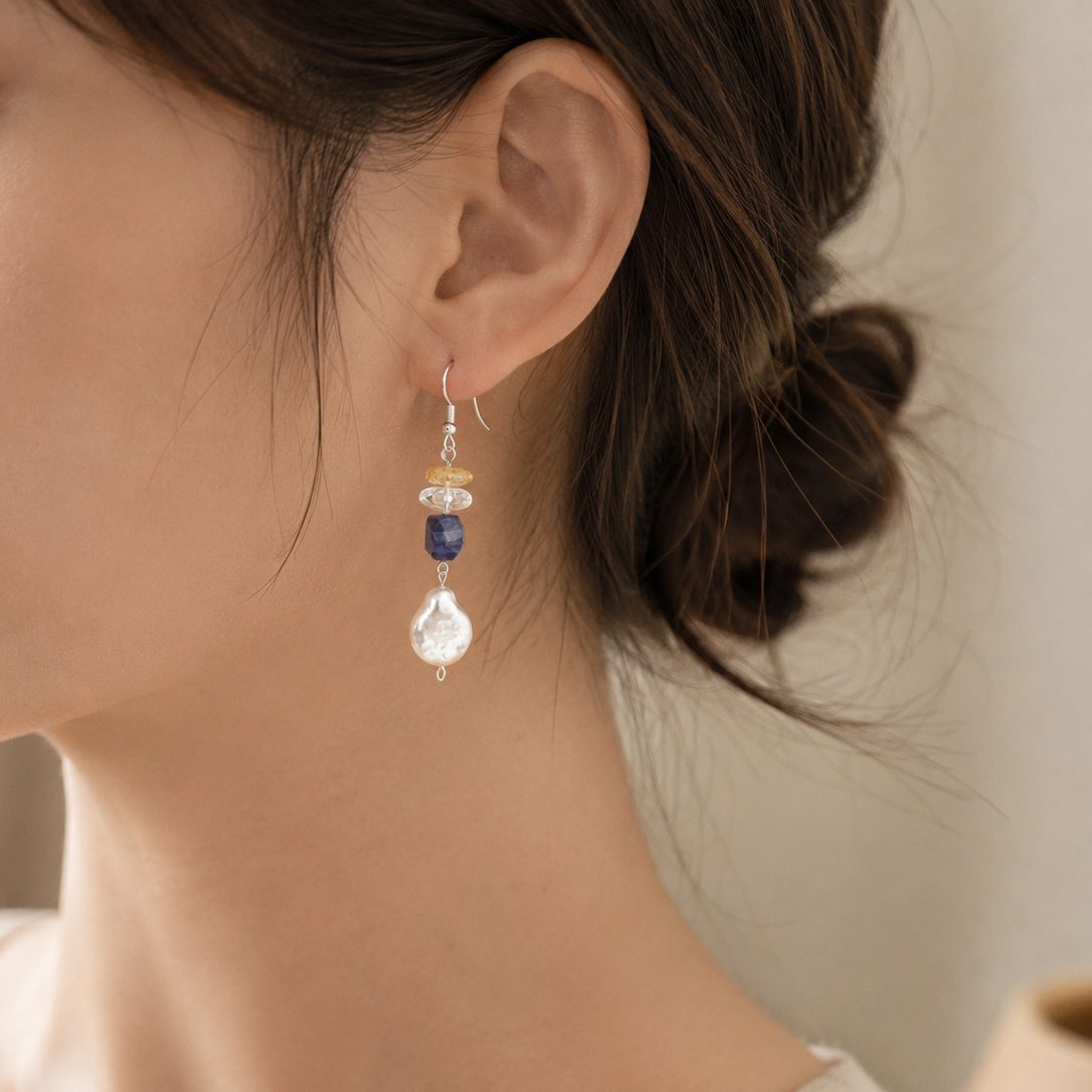 Sodalite, citrine and freshwater pearl drop earring worn on left ear