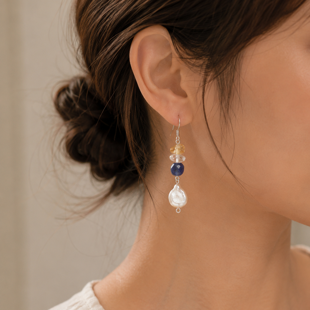 Sodalite, citrine and freshwater pearl drop earring worn on right ear