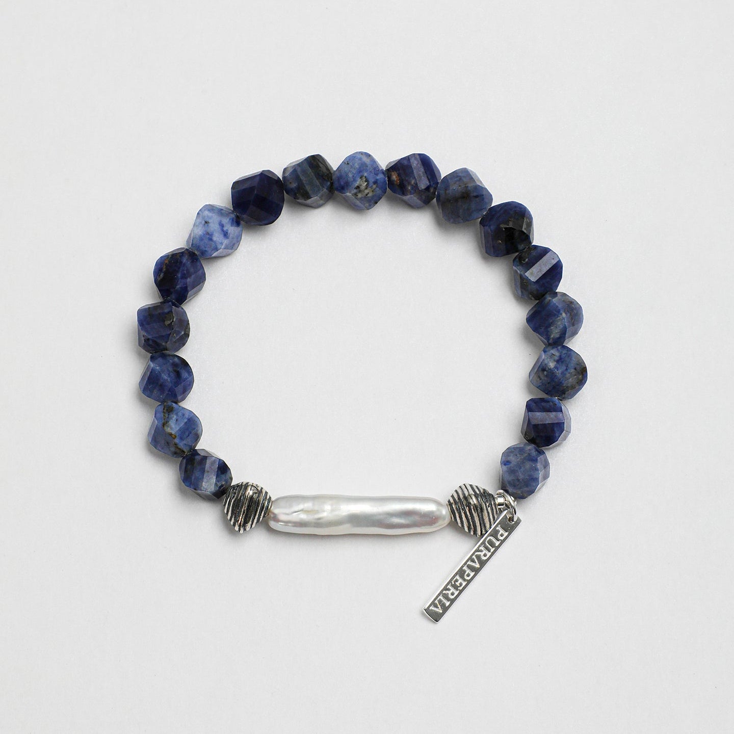Handcrafted sodalite and freshwater pearl statement bracelet with textured silver-tone accents