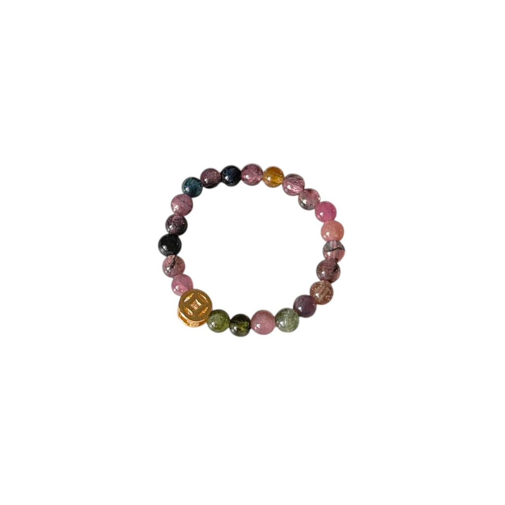 Tourmaline & Fortune Bead Stretch Beaded Ring featuring natural multicolour Tourmaline round beads and a gold-tone carved fortune bead on a comfortable elastic band